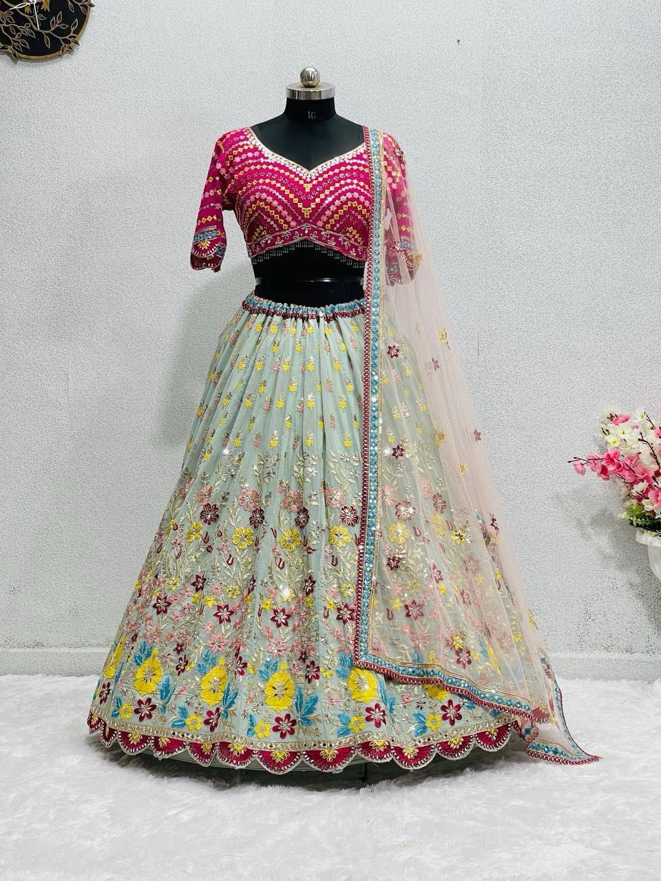 Designer Embroidered Net Lehenga with Heavy Mirror Work Blouse